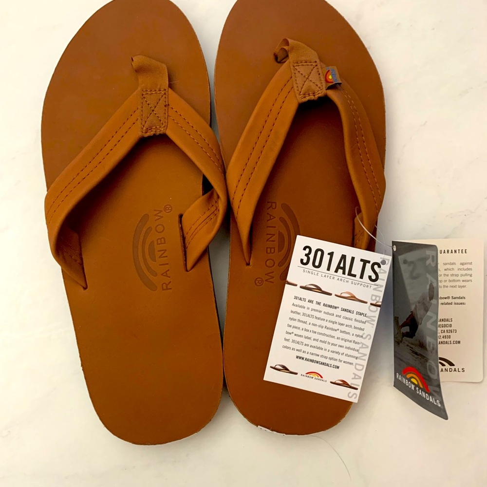 Brand new never worn Rajnbow men’s sandals, with tags. Fits 10 or 10.5.